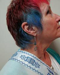 Lynn is our model for this style of earrings in our Messianic line.