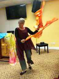 Lora (owner) demonstrating Firebrand Silk Flags witn flexi-rods