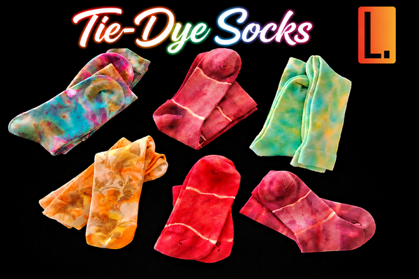 Tie-dye socks designed by Lora, featuring vibrant hand-dyed patterns