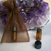 Small dram sized glass bottle with your choice of fragrant essential oil blends