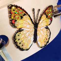 Yellow butterfly sequin applique embellishment